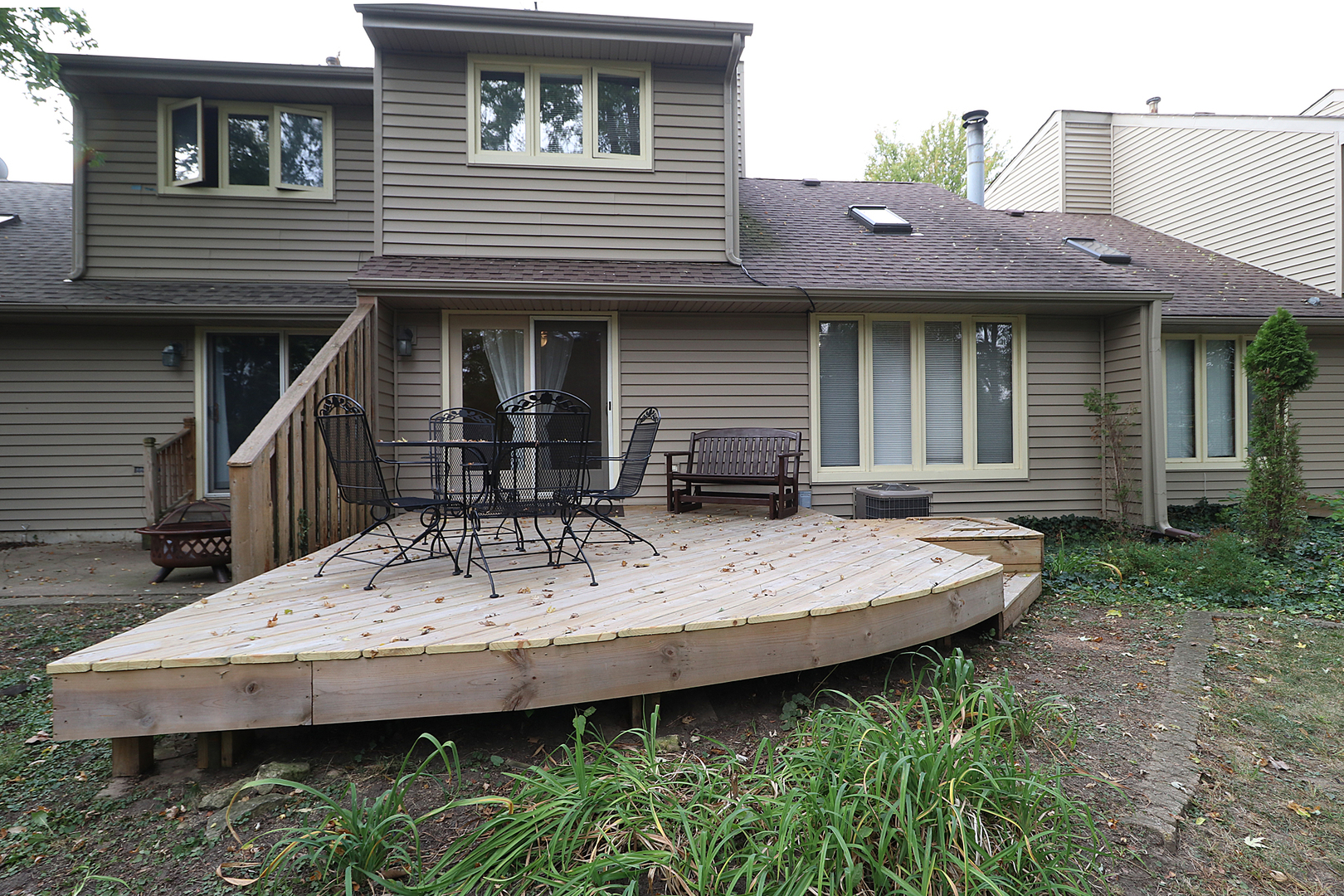 14803 South Penn Road Plainfield, IL 60544 - Photo 16 of 17 a view of a house with wooden deck
