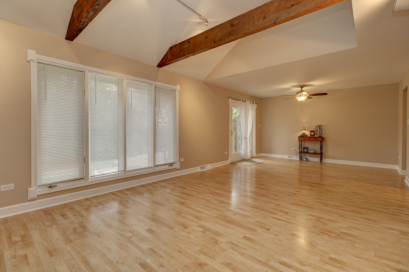 14803 South Penn Road Plainfield, IL 60544 - Photo 4 of 17 a view of empty room with wooden floor