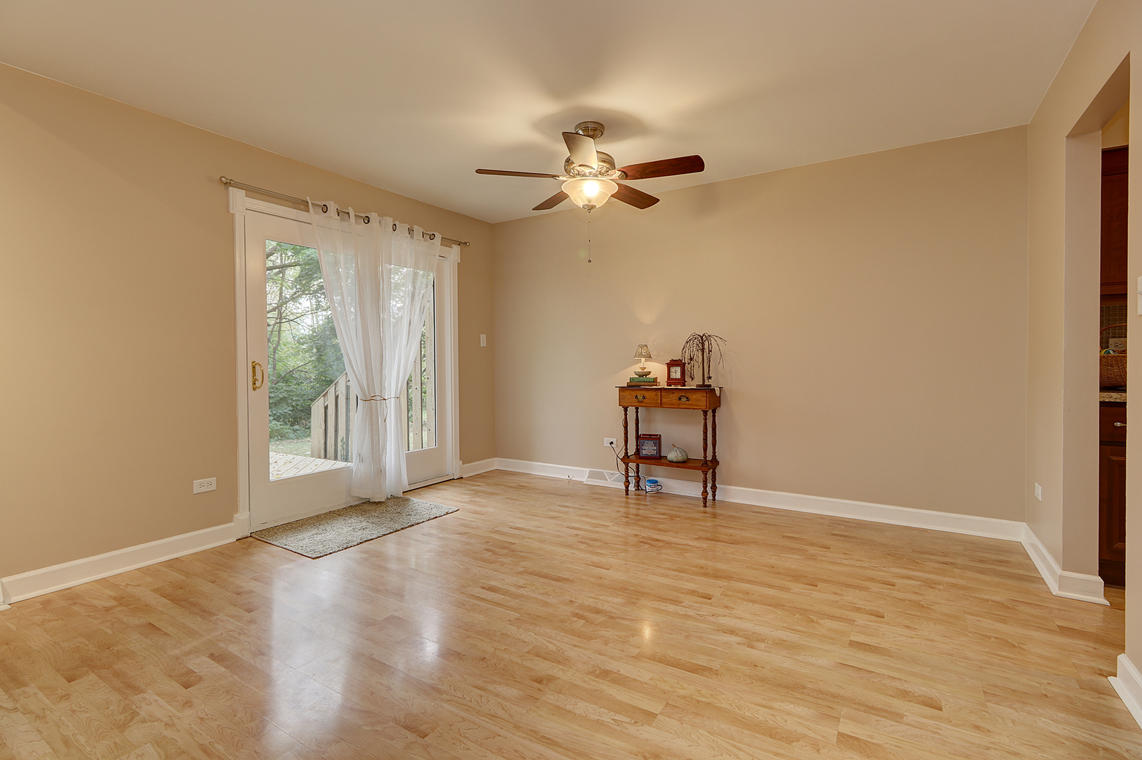 14803 South Penn Road Plainfield, IL 60544 - Photo 5 of 17 a view of an empty room with a window