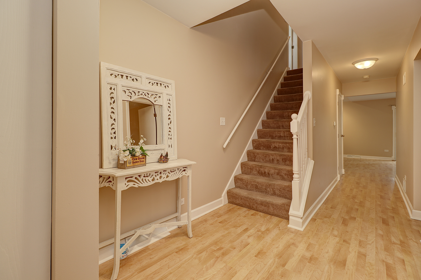 14803 South Penn Road Plainfield, IL 60544 - Photo 8 of 17 a view of a hallway with entryway and wooden floor