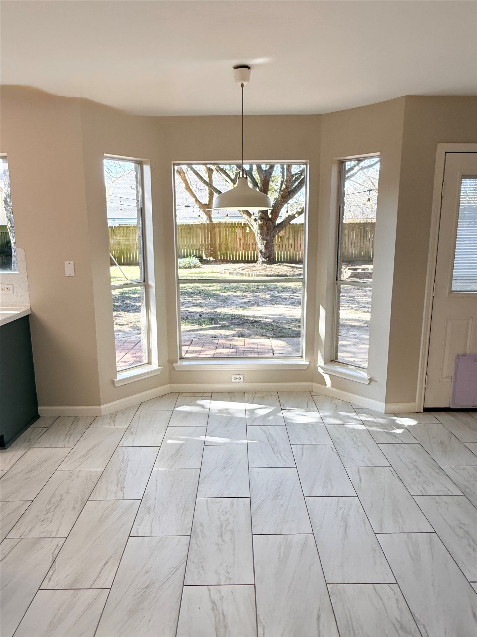 245 North Ranch House Road Angleton, TX 77515 - Photo 6 of 19 This charming breakfast area is bathed in natural light and offers a welcoming space to enjoy your morning coffee or casual meals.