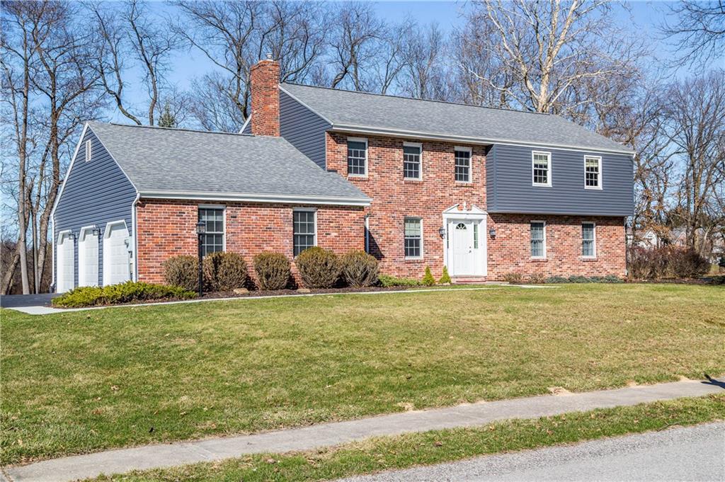 Beautiful House on a Beautiful spectacular mostly level lot with a 3 Car Attached garage with overhead storage!