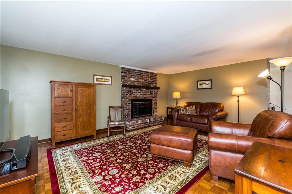 230 Ridgeview Drive Wexford, PA 15090 - Photo 11 of 25 Beautiful Large Family Room with a Brick Log Burning Fireplace off the Kitchen