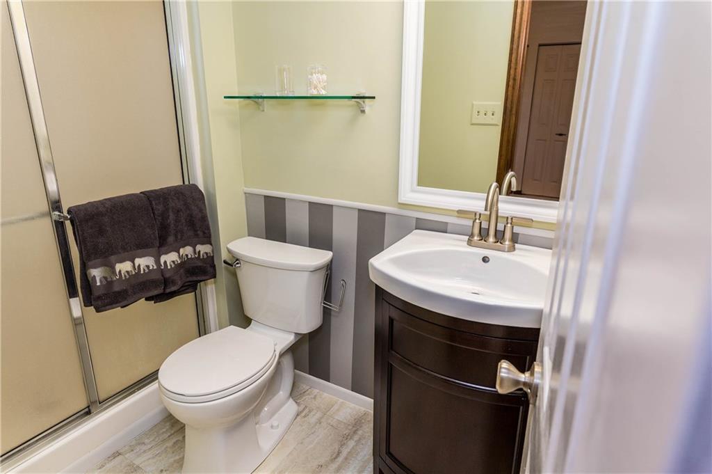 230 Ridgeview Drive Wexford, PA 15090 - Photo 15 of 25 Master Bath , with updated commode, vanity , lighting, flooring.