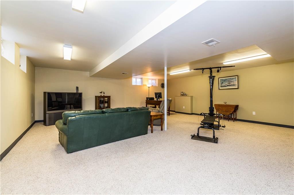 230 Ridgeview Drive Wexford, PA 15090 - Photo 20 of 25 Lower Level Finished Basement area.. This room is used as another Tv Room, Exercise area .. it is LARGE