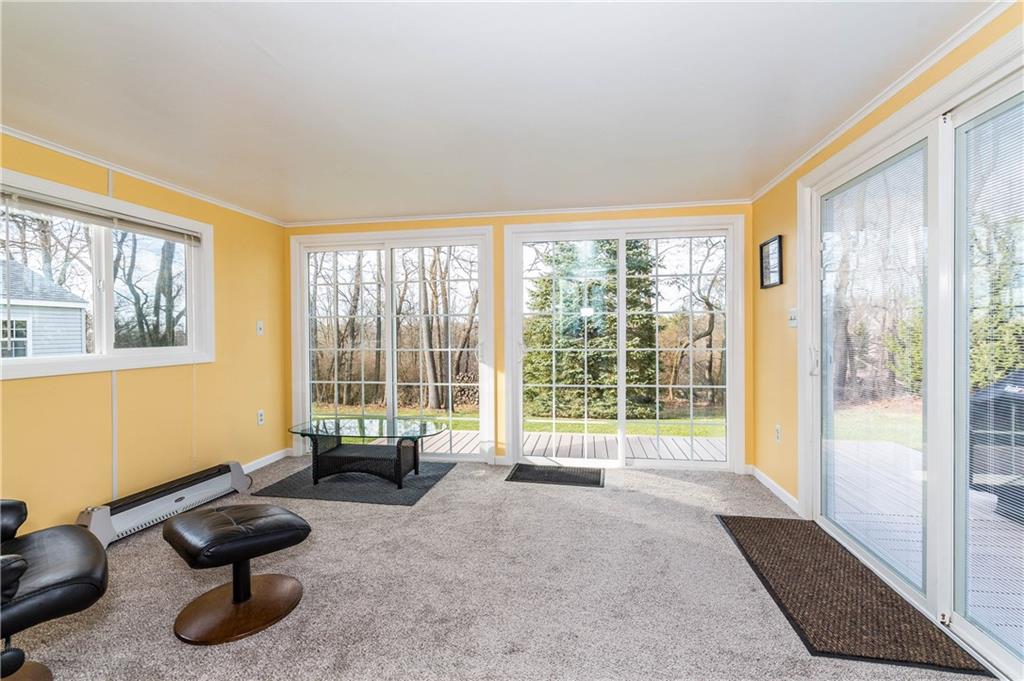 230 Ridgeview Drive Wexford, PA 15090 - Photo 10 of 25 3 Season Room LOOK at that VIEW !! Pella Doors and the Sliders to the Right have the BLINDS BUILT into the glass doors. There is a floor Heater as well for those colder days when you want to have your morning coffee or tea to enjoy that view...