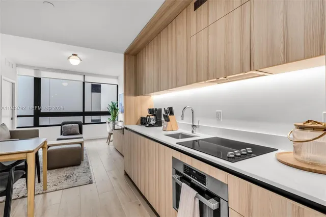 a kitchen with a stove and a sink