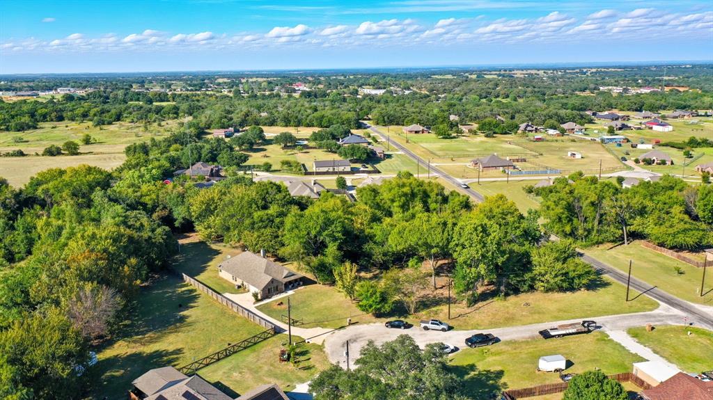 Tbd Candis Court Springtown, TX 76082 - Photo 8 of 13 Aerial view of property's location featuring a tree filled landscape