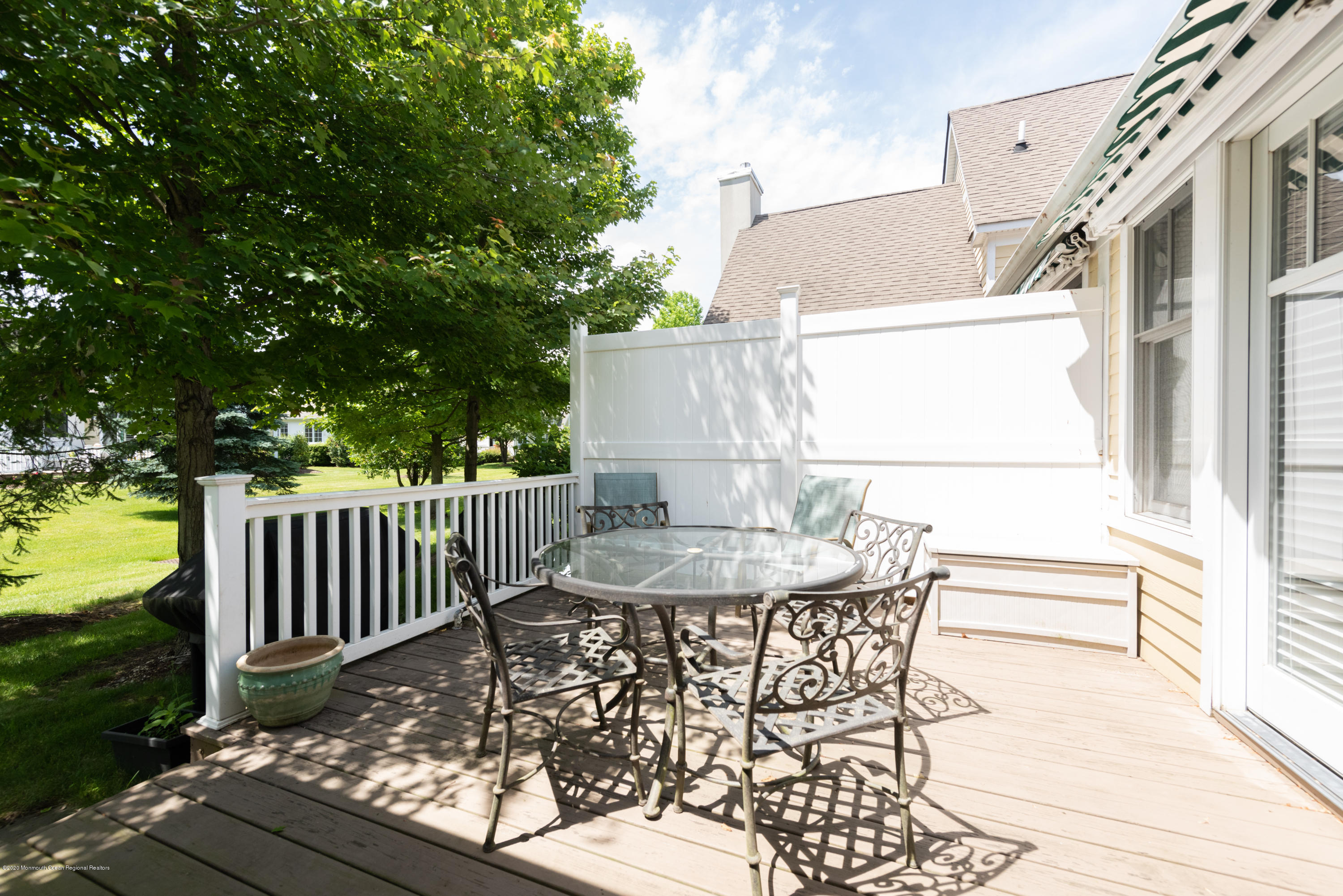 10 Adams Way Shrewsbury, NJ 07702 - Photo 15 of 19 a view of a table and chairs in the patio