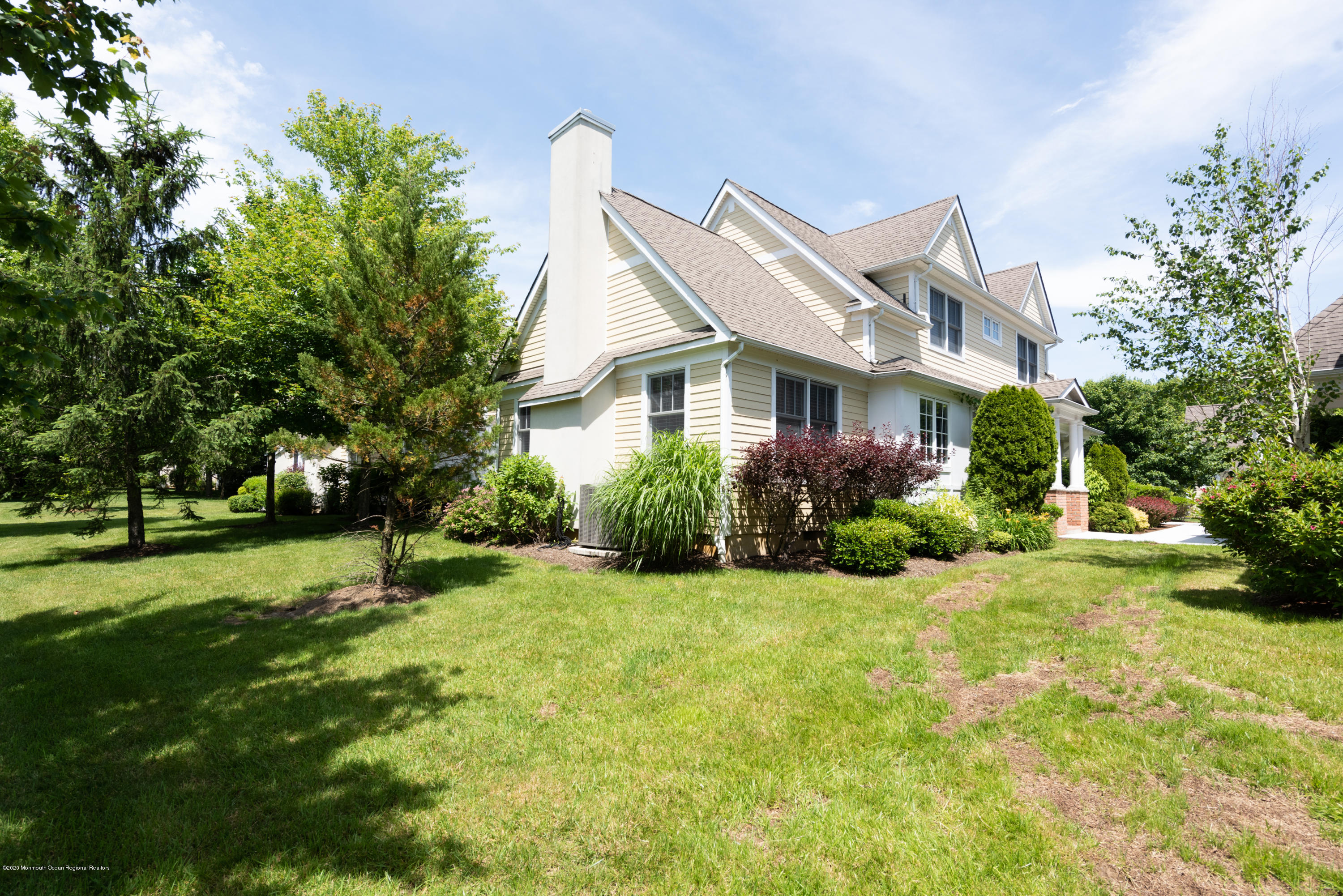 10 Adams Way Shrewsbury, NJ 07702 - Photo 17 of 19 a view of a house with a big yard plants and large trees