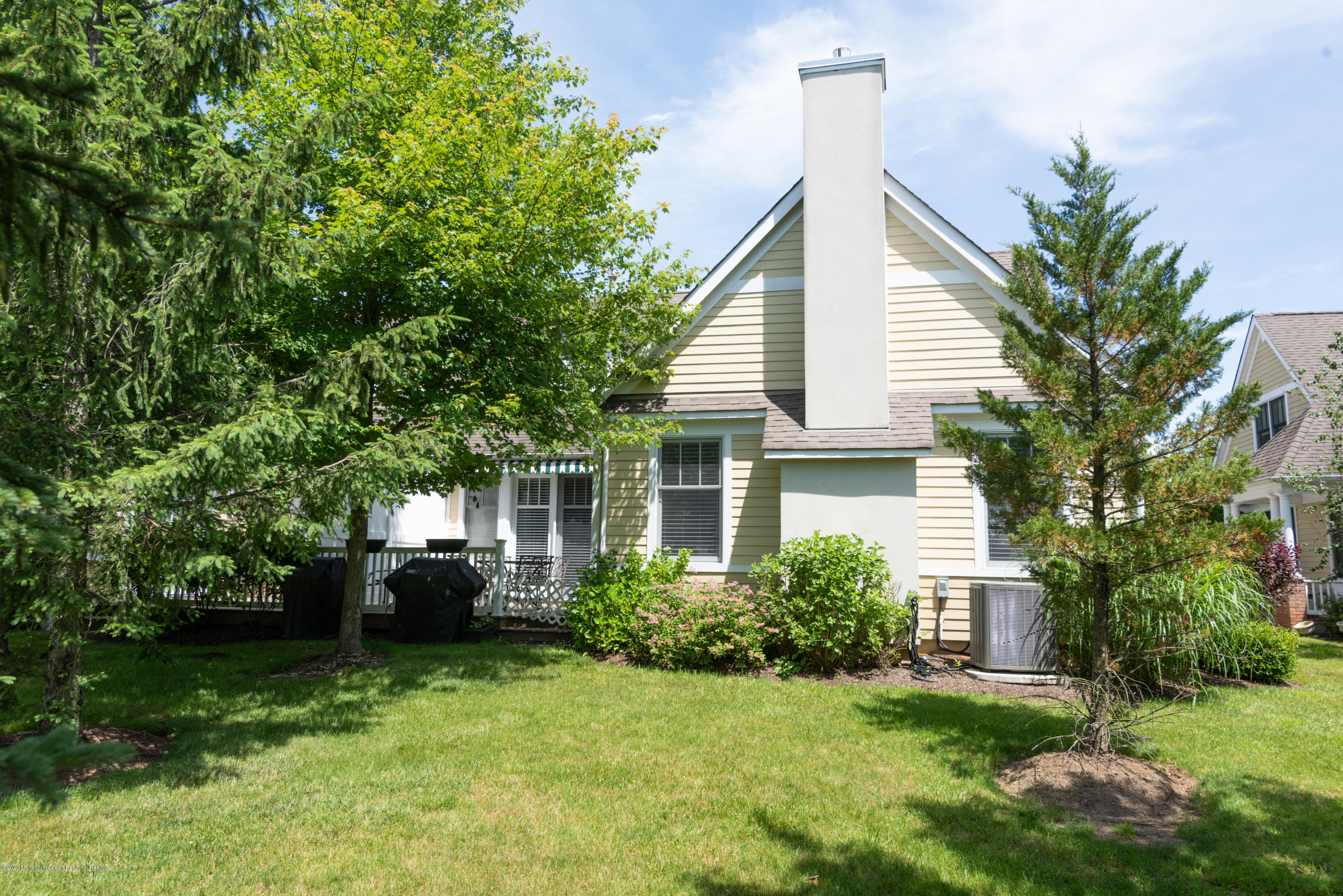 10 Adams Way Shrewsbury, NJ 07702 - Photo 18 of 19 a front view of house with a garden