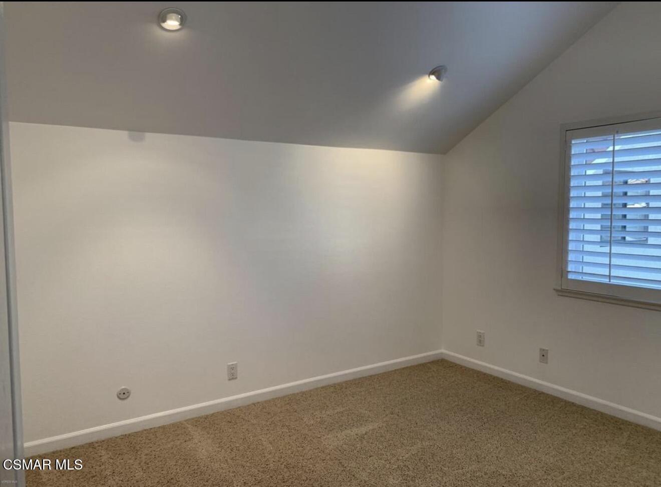924 Thistlegate Road Oak Park, CA 91377 - Photo 11 of 20 an empty room with a window