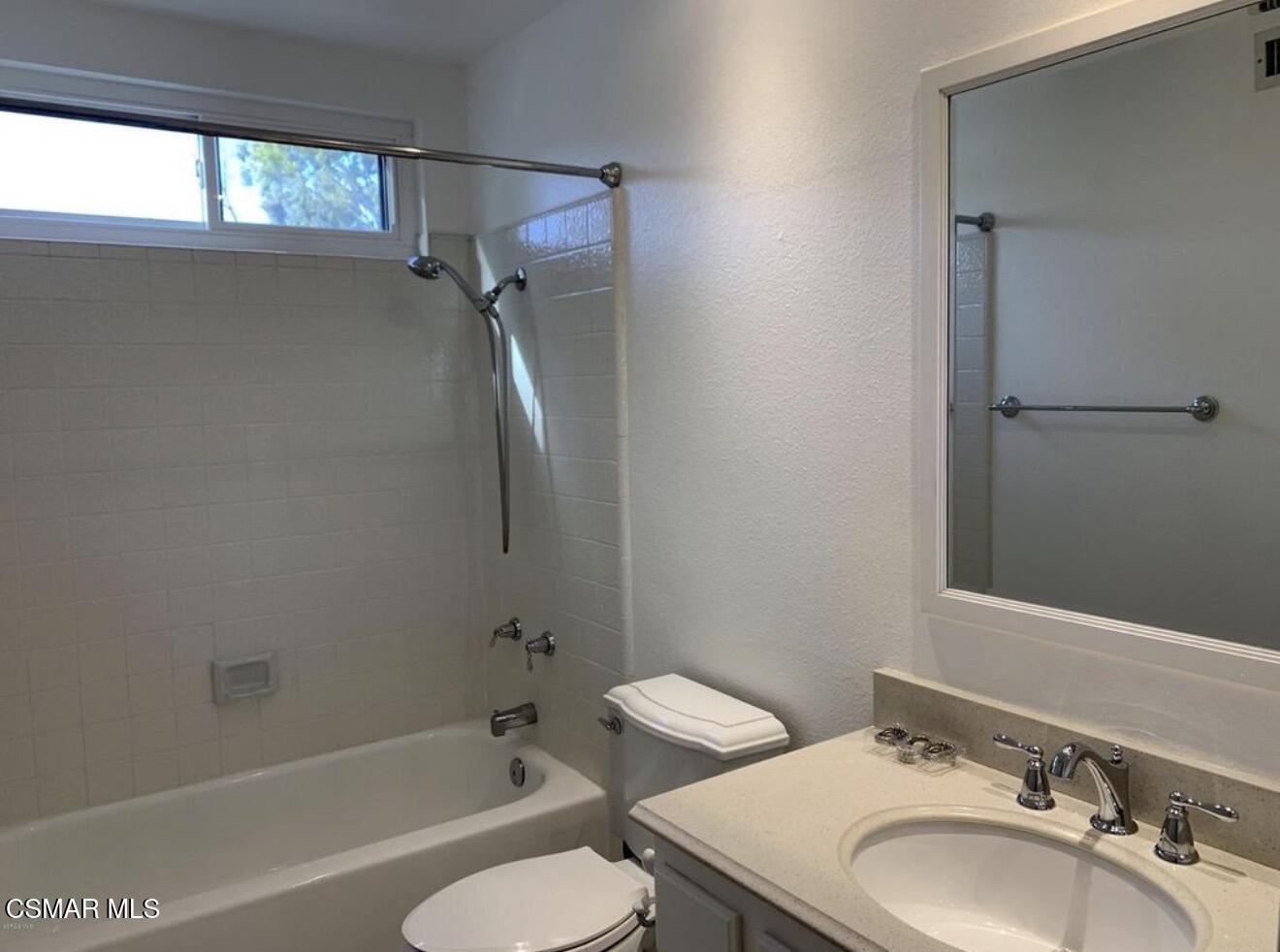 924 Thistlegate Road Oak Park, CA 91377 - Photo 12 of 20 a bathroom with a sink toilet and shower
