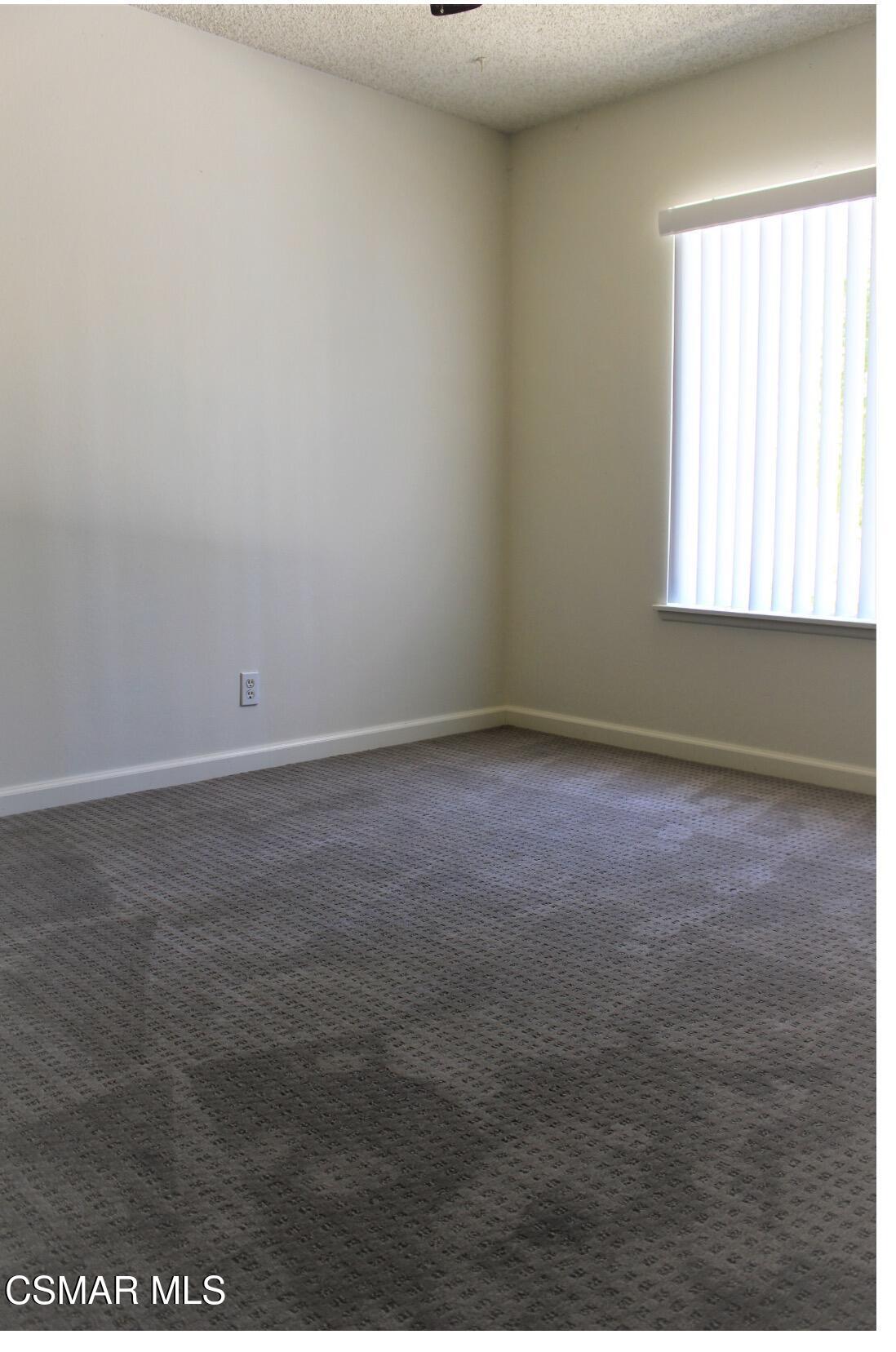 924 Thistlegate Road Oak Park, CA 91377 - Photo 15 of 20 an empty room with an empty space