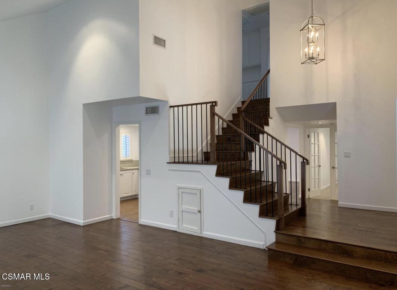 924 Thistlegate Road Oak Park, CA 91377 - Photo 2 of 20 a view of entryway and hall with wooden floor