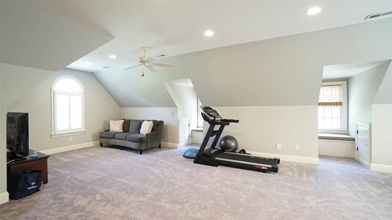 12512 Bayleaf Church Road Raleigh, NC 27614 - Photo 16 of 30 Second stair access to bonus room, oversized w/ built in window seats, good light. Has half bath Bonus Room