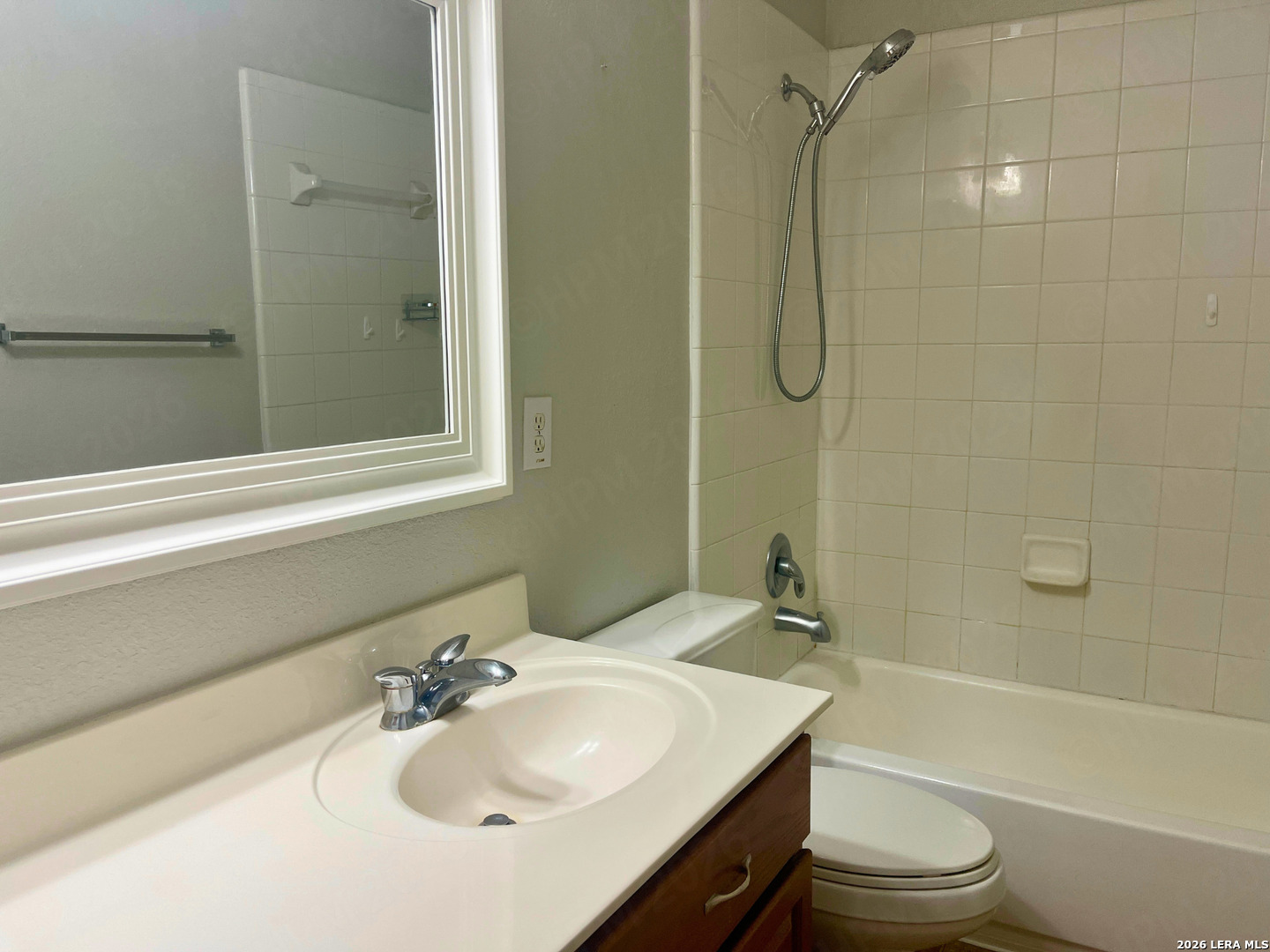 324 Willow Loop Cibolo, TX 78108 - Photo 16 of 20 a bathroom with a sink toilet and shower