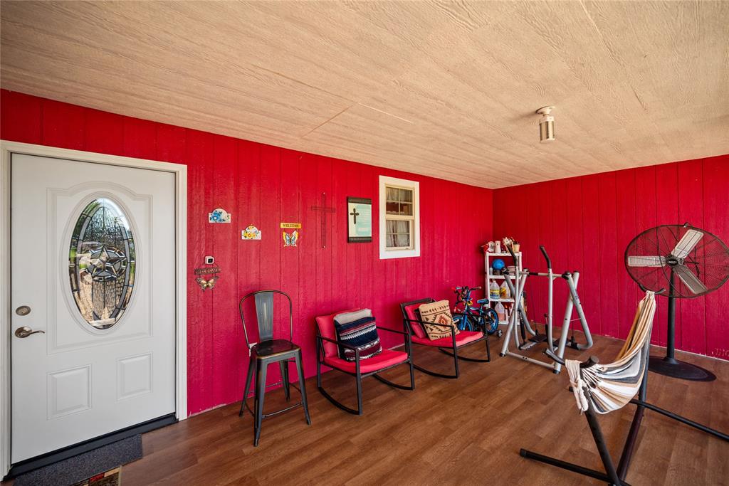 447 Masthead Road Gun Barrel City, TX 75156 - Photo 7 of 27 a living room with furniture and wooden floor