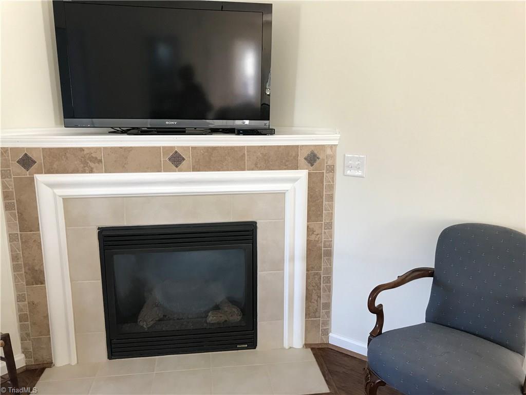 115 Brae Ridge Lane King, NC 27021 - Photo 3 of 14 Gas log fireplace with space for TV!