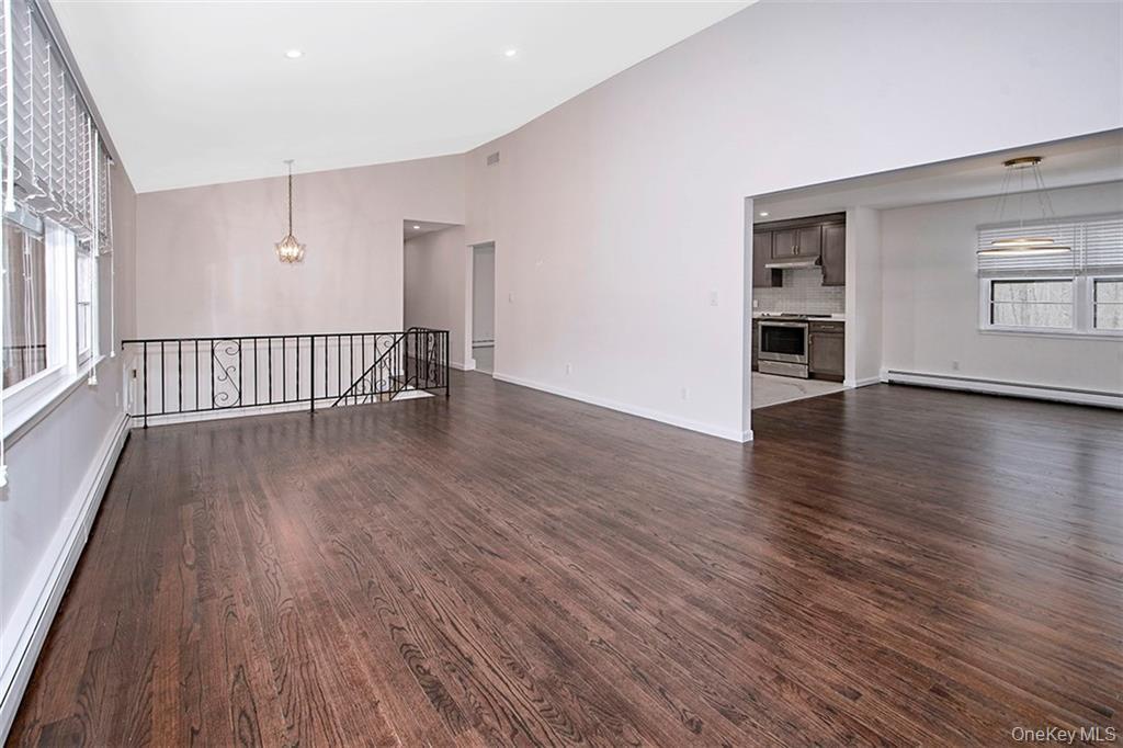 74 Edgewood Road Ossining, NY 10562 - Photo 6 of 23 a view of an empty room with window and wooden floor