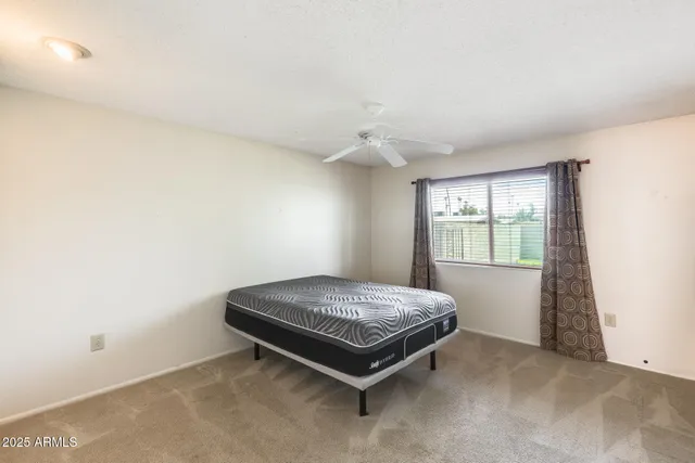 a kitchen with a sink appliances and cabinets