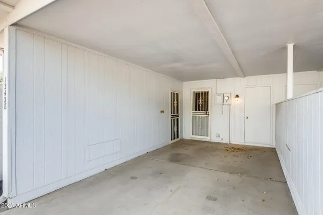 a view of a front of house with a street