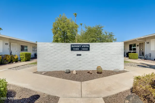 a view of a park with tree s