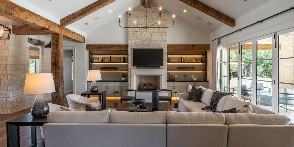 811 Boot Ranch Circle Fredericksburg, TX 78624 - Photo 12 of 34 a living room with fireplace furniture and a large window