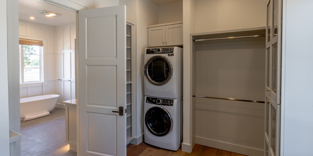 811 Boot Ranch Circle Fredericksburg, TX 78624 - Photo 19 of 34 a utility room with dryer and washer
