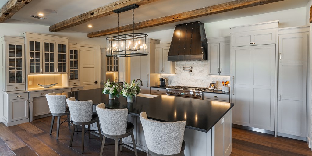 811 Boot Ranch Circle Fredericksburg, TX 78624 - Photo 21 of 34 a dining room with furniture a window and wooden floor
