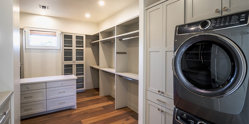 811 Boot Ranch Circle Fredericksburg, TX 78624 - Photo 29 of 34 a view of walk in closet with clothes and shoes