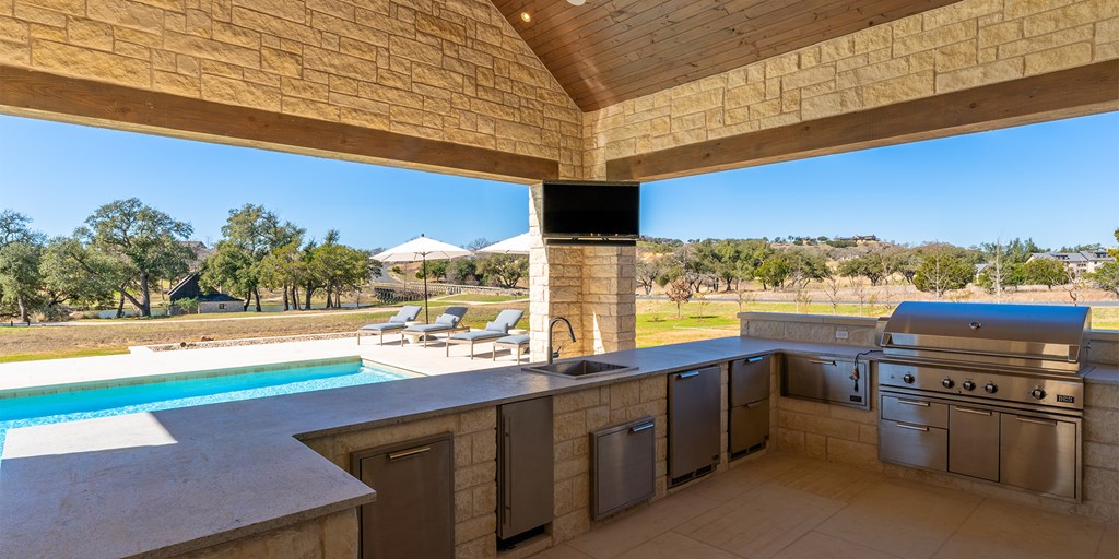 811 Boot Ranch Circle Fredericksburg, TX 78624 - Photo 5 of 34 a view of a patio with a ocean view