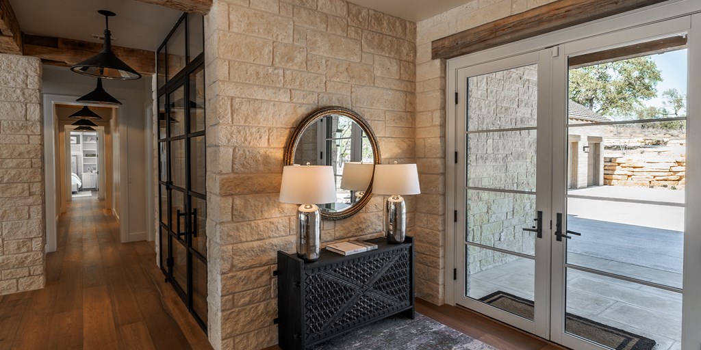 811 Boot Ranch Circle Fredericksburg, TX 78624 - Photo 7 of 34 a view of a balcony and wooden floor
