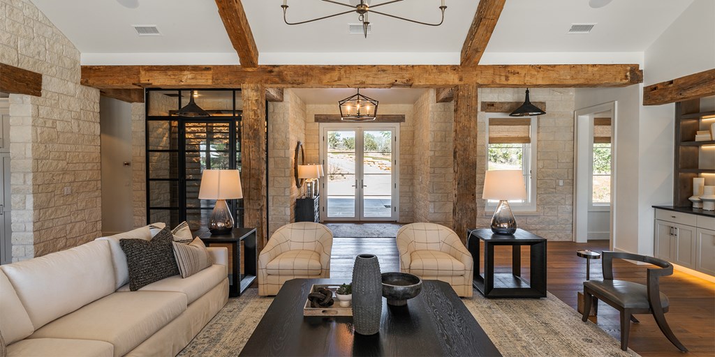 811 Boot Ranch Circle Fredericksburg, TX 78624 - Photo 8 of 34 a living room with furniture and a large window