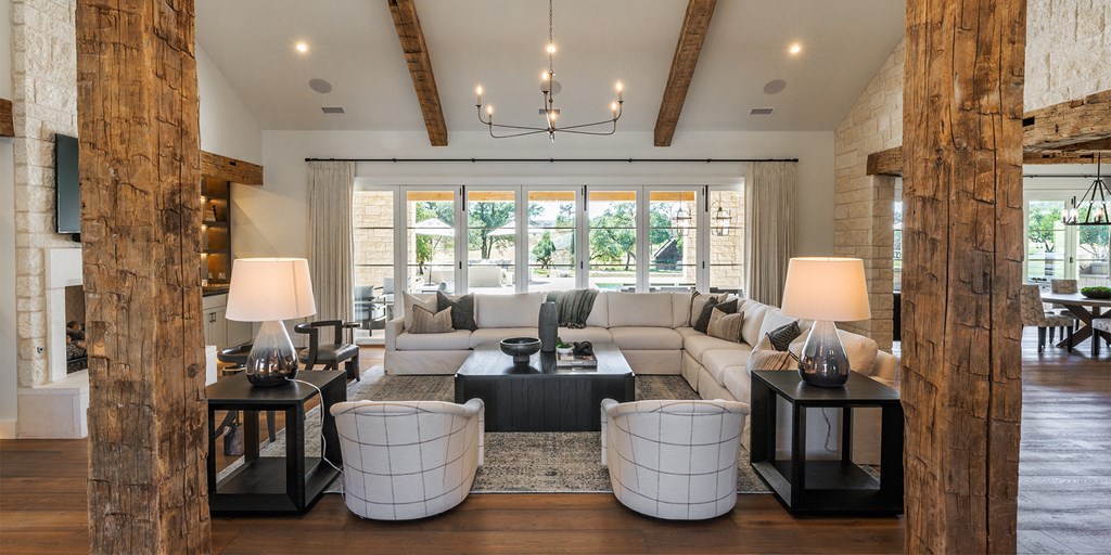 811 Boot Ranch Circle Fredericksburg, TX 78624 - Photo 9 of 34 a living room with furniture and a large window