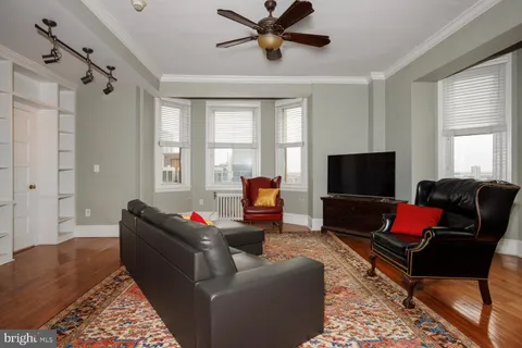 a living room with furniture or couch and a flat screen tv