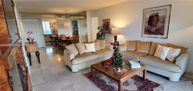 a kitchen with stainless steel appliances granite countertop a stove and a refrigerator