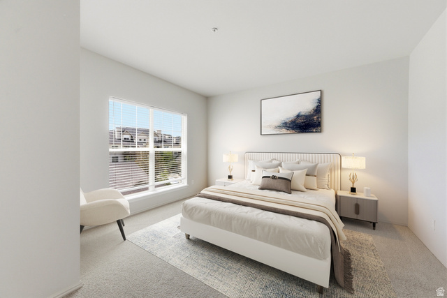900 Bitner Road, Unit P20 Park City, UT 84098 - Photo 22 of 42 Bright bedroom featuring large windows, neutral carpeting, and a spacious layout