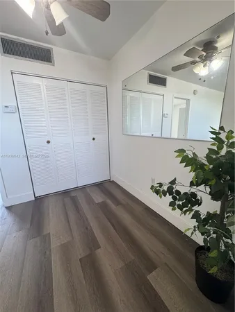 a kitchen that has a sink and a stove