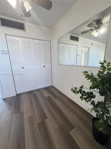 a kitchen that has a sink and a stove