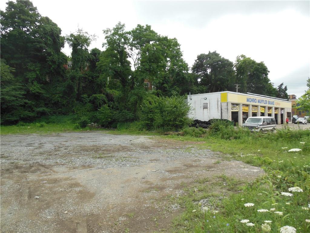 2713-2715 Library Road Overbrook, PA 15234 - Photo 5 of 8 a view of a house with a yard