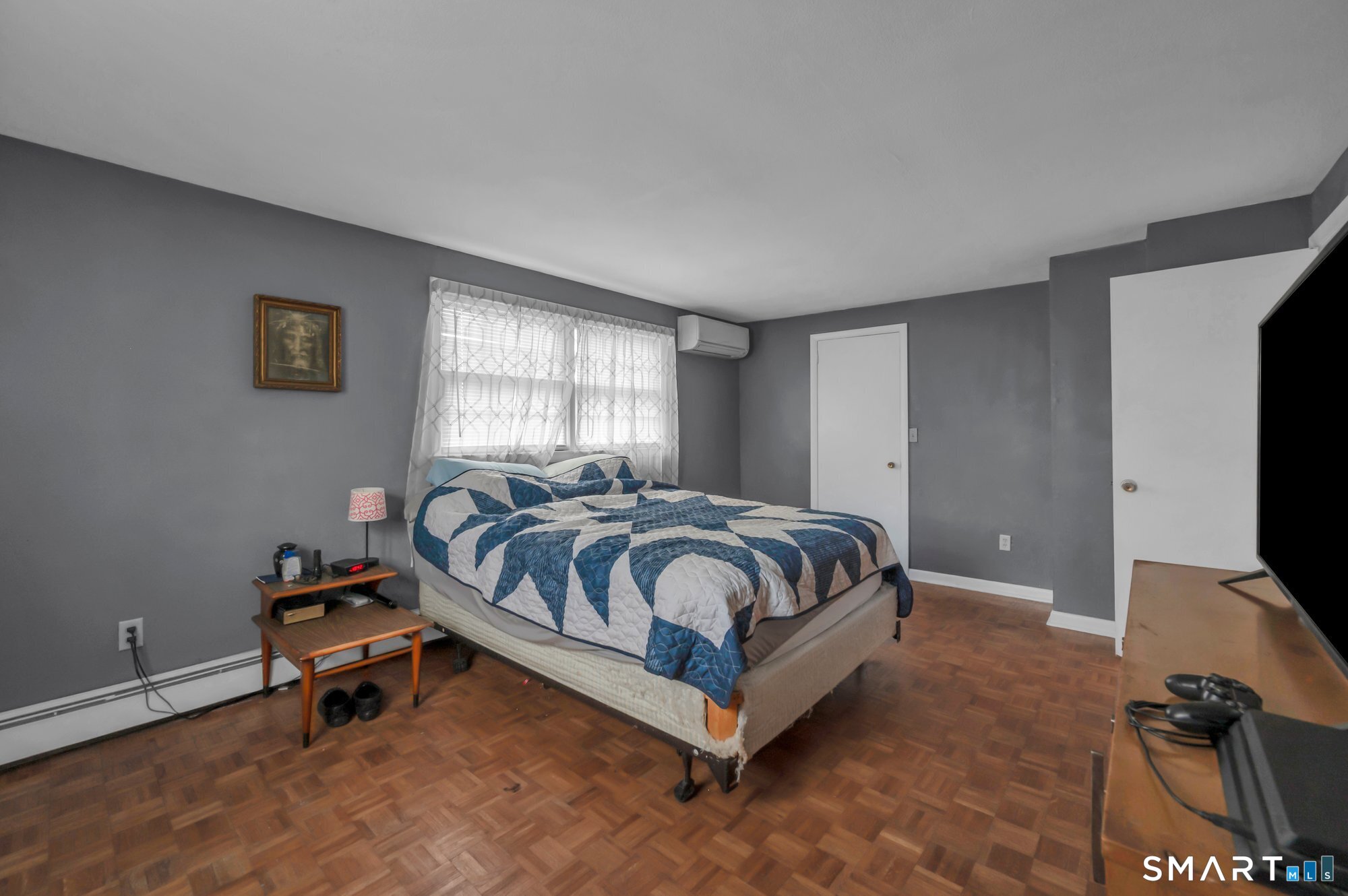 1105 Northrop Road Wallingford, CT 06492 - Photo 22 of 34 Nice size Primary Bedroom with mini split