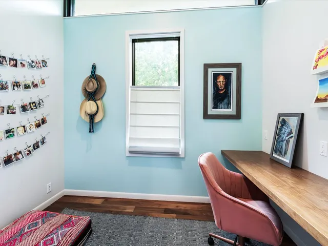 a room with furniture and wooden floor