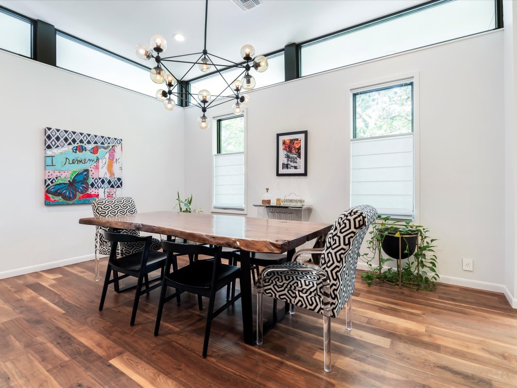 1703 Dexter Street Austin, TX 78704 - Photo 7 of 38 a view of a dining room with furniture and wooden floor