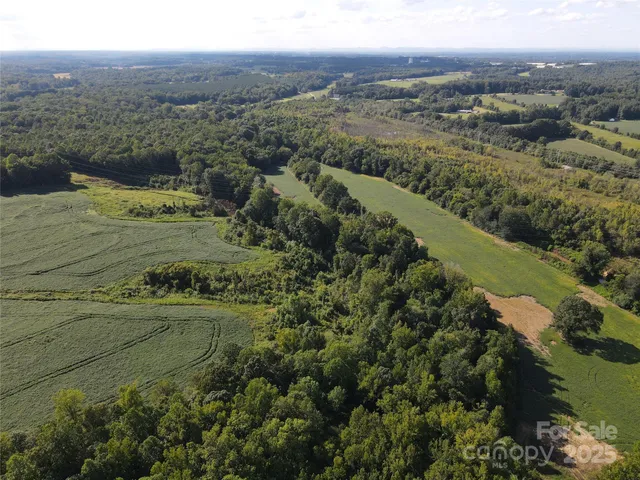 a view of a lake with mountains in the back