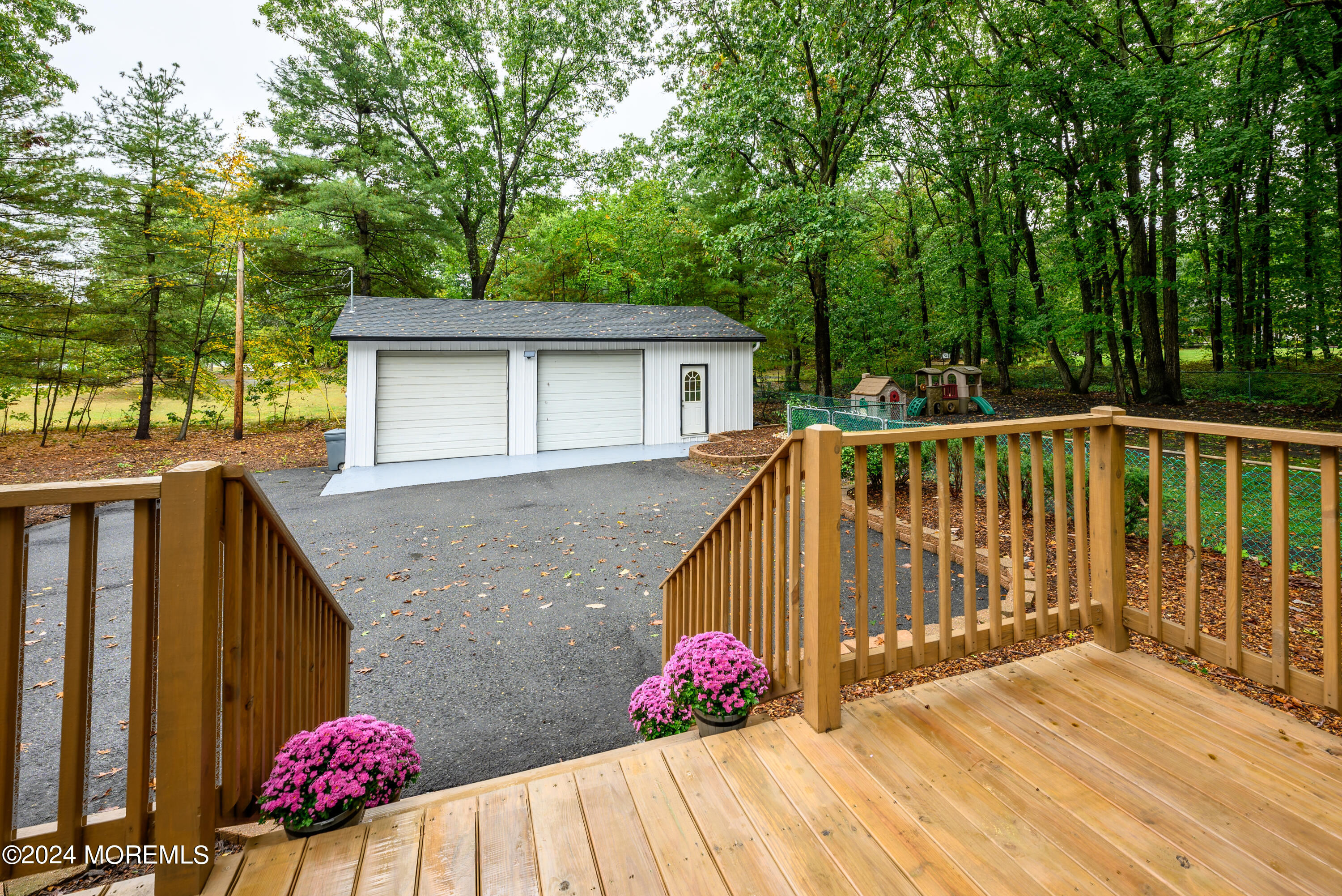 50 Old Turkey Swamp Road Freehold, NJ 07728 - Photo 23 of 23 a view of a house with backyard and sitting area