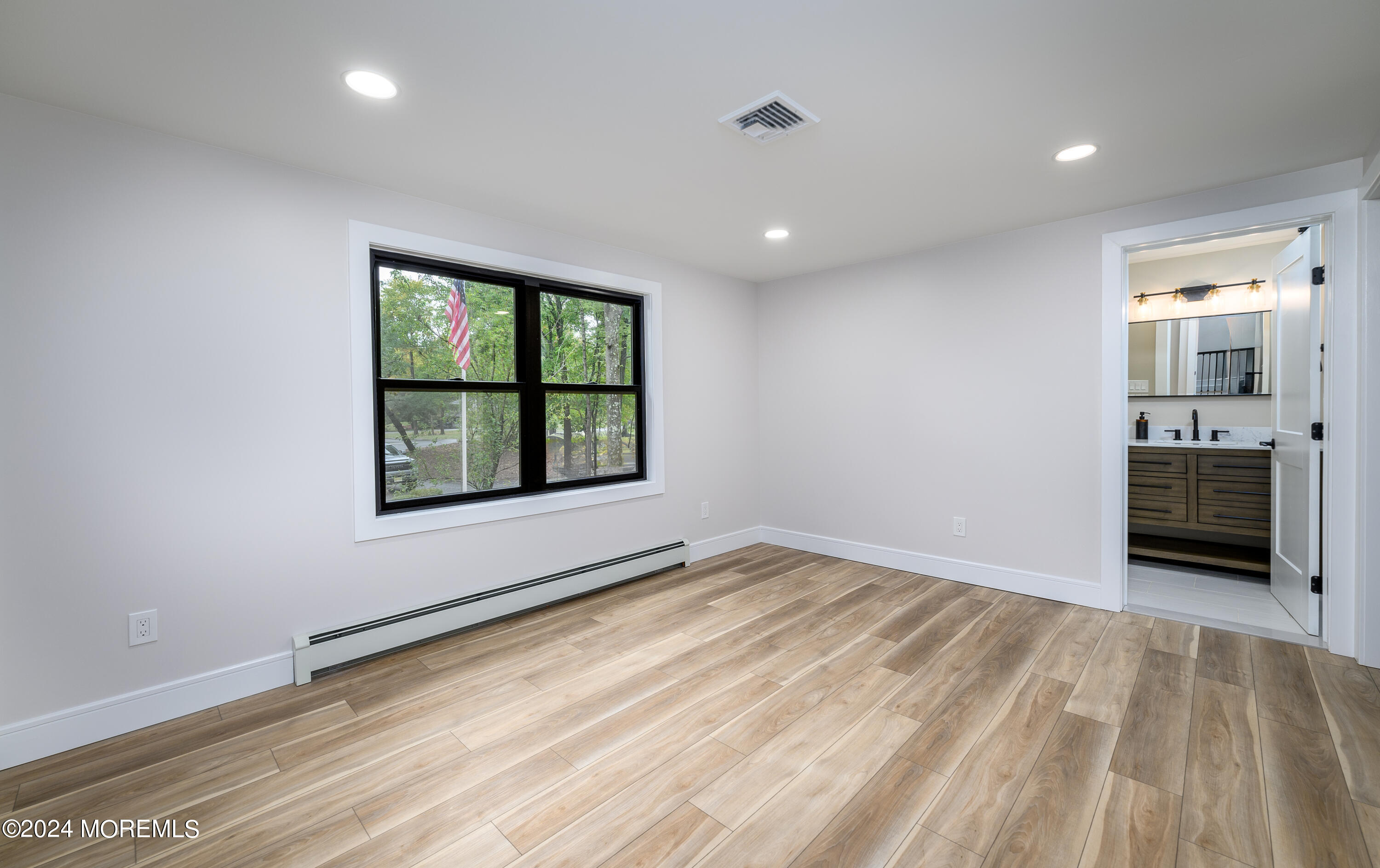 50 Old Turkey Swamp Road Freehold, NJ 07728 - Photo 4 of 23 a view of an empty room with a window