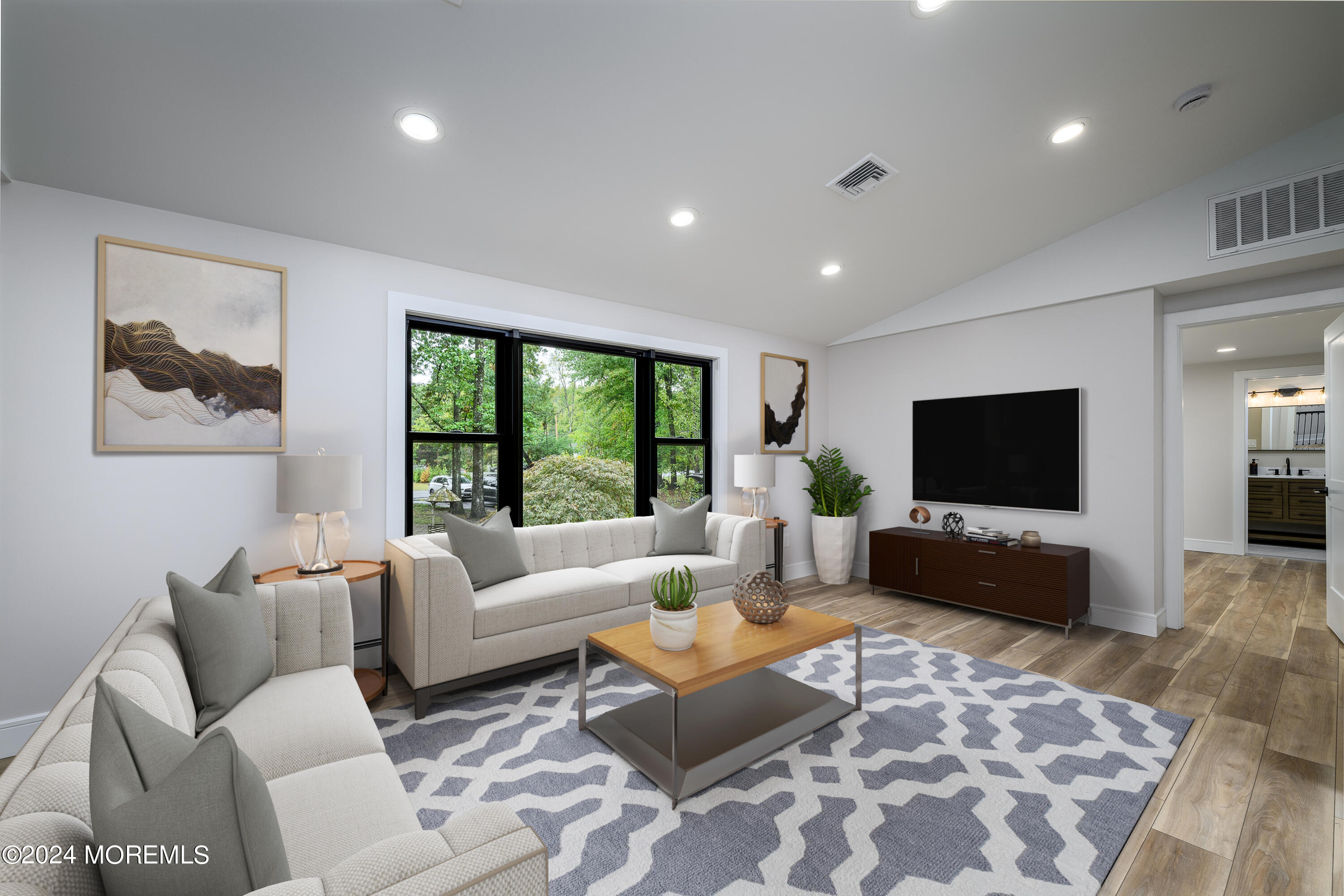 50 Old Turkey Swamp Road Freehold, NJ 07728 - Photo 5 of 23 a living room with furniture and a flat screen tv