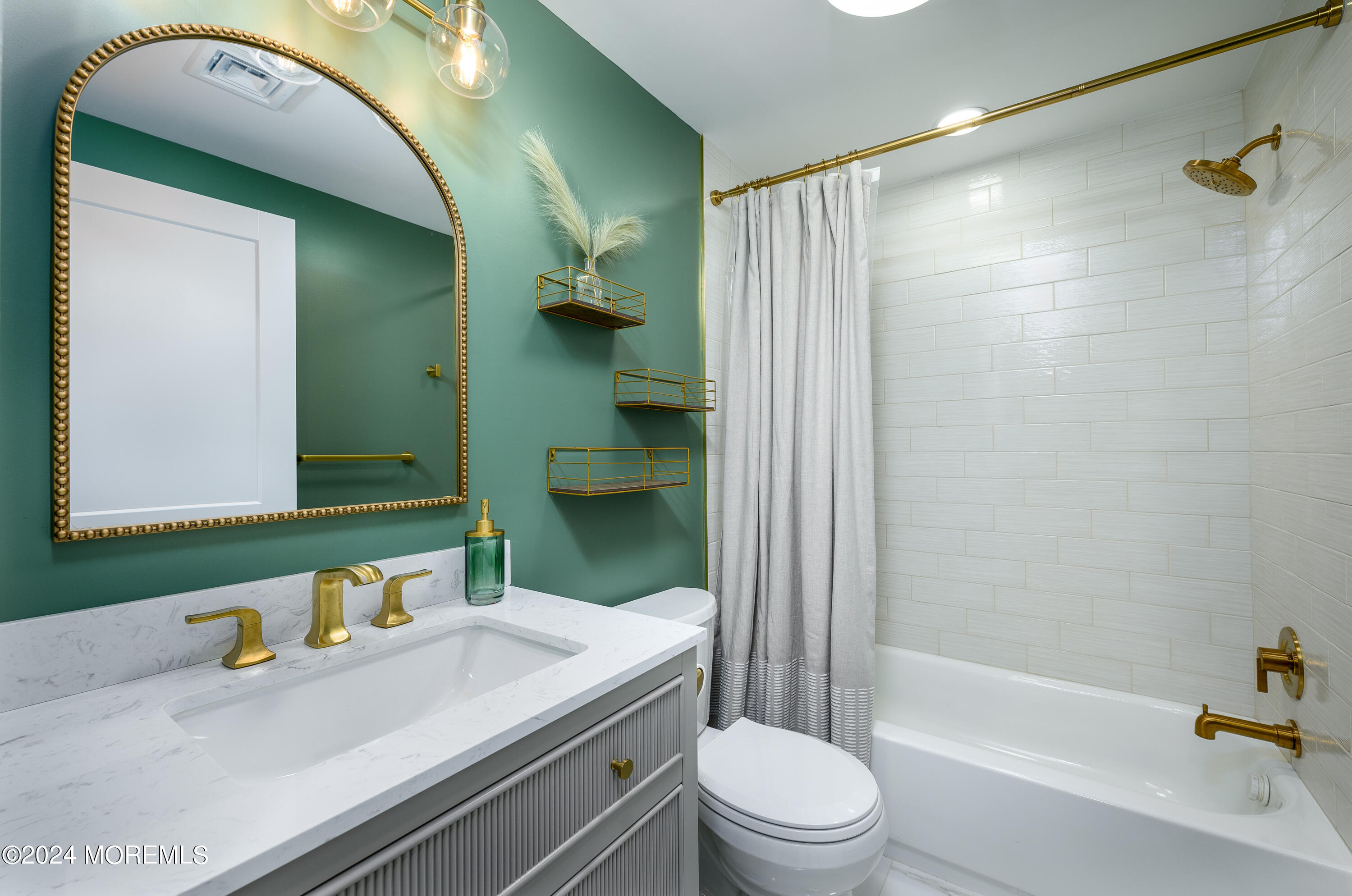 50 Old Turkey Swamp Road Freehold, NJ 07728 - Photo 7 of 23 a bathroom with a sink a toilet and shower