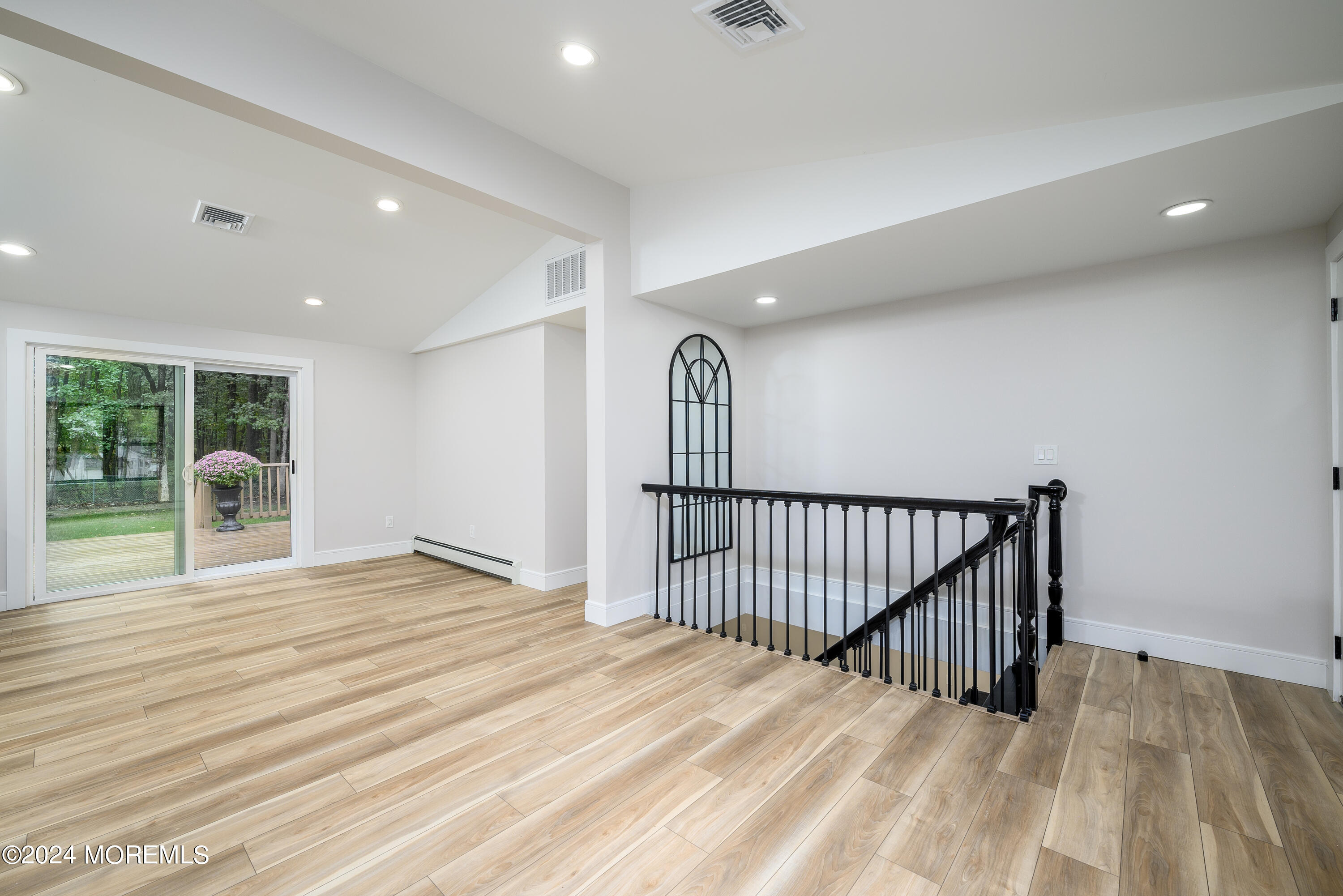50 Old Turkey Swamp Road Freehold, NJ 07728 - Photo 10 of 23 a view of a room with wooden floor